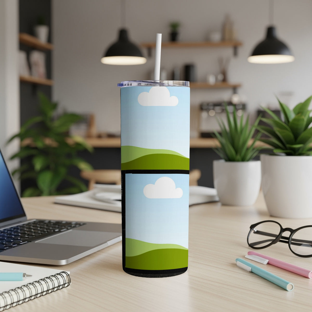 Tumbler with cartoon clouds and rolling green hills design.