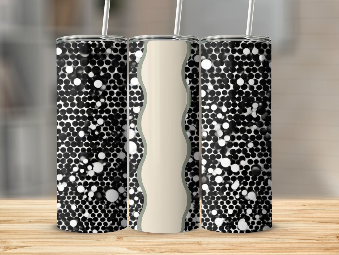 Three tumblers with a black and white polka dot pattern and a beige wavy stripe.