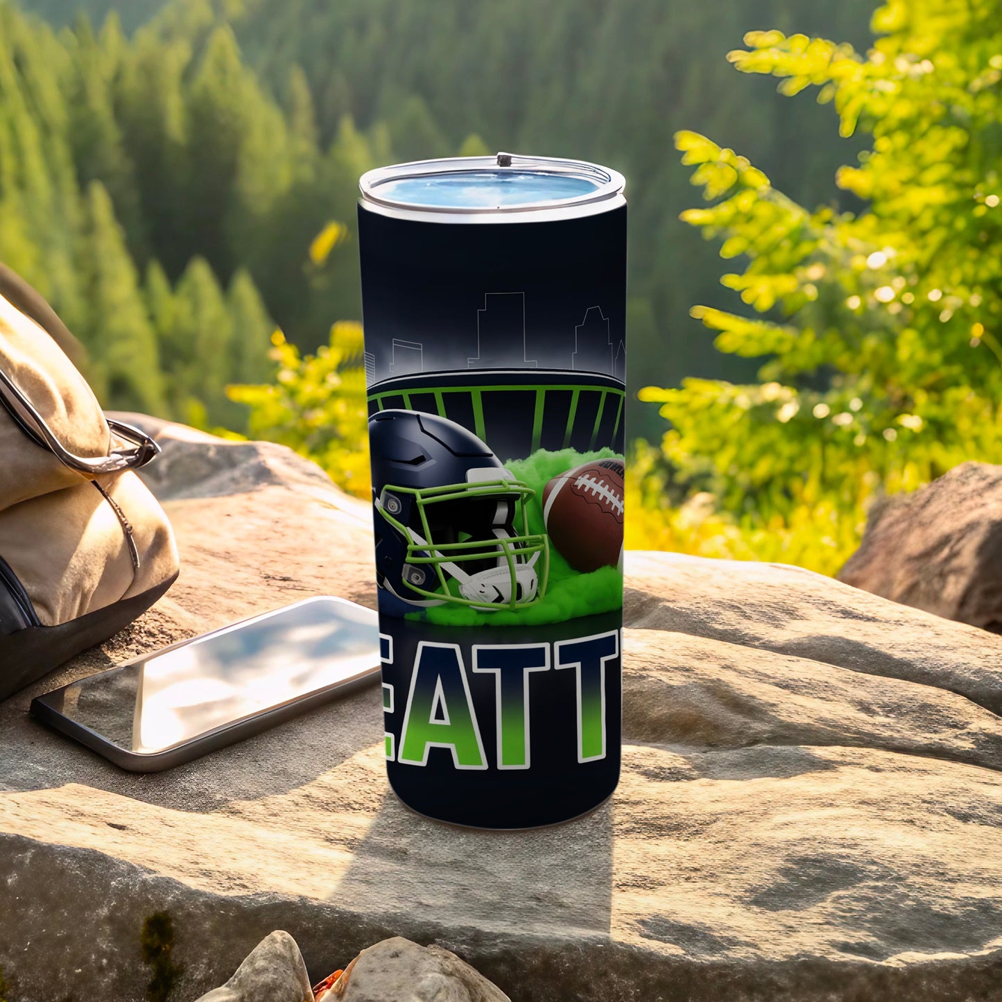 Seattle Seahawks helmet and football on tumbler with city skyline.