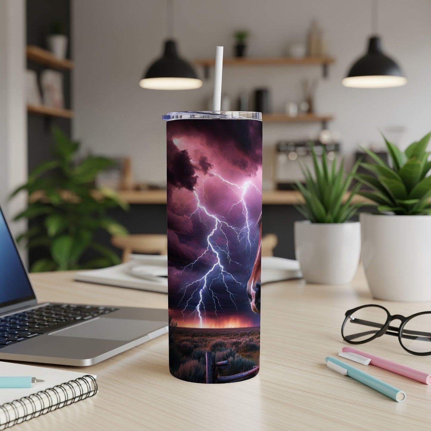 Tumbler with a dramatic lightning storm over a ranch landscape.