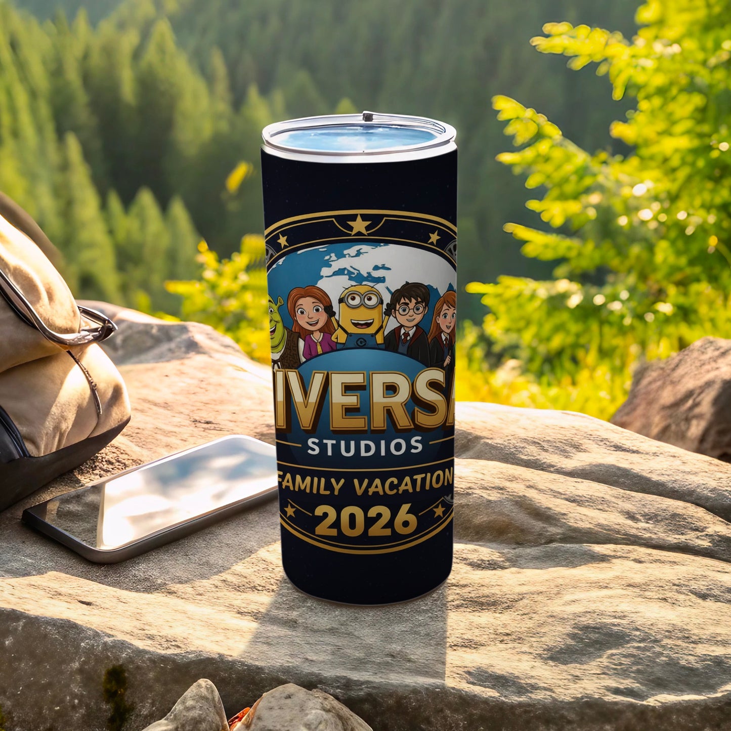 Universal Studios Family Vacation 2026 tumbler with characters on dark blue background.