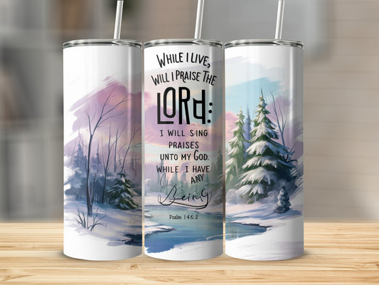 Winter landscape with snowy trees and a tumbler featuring Psalm 146:2.