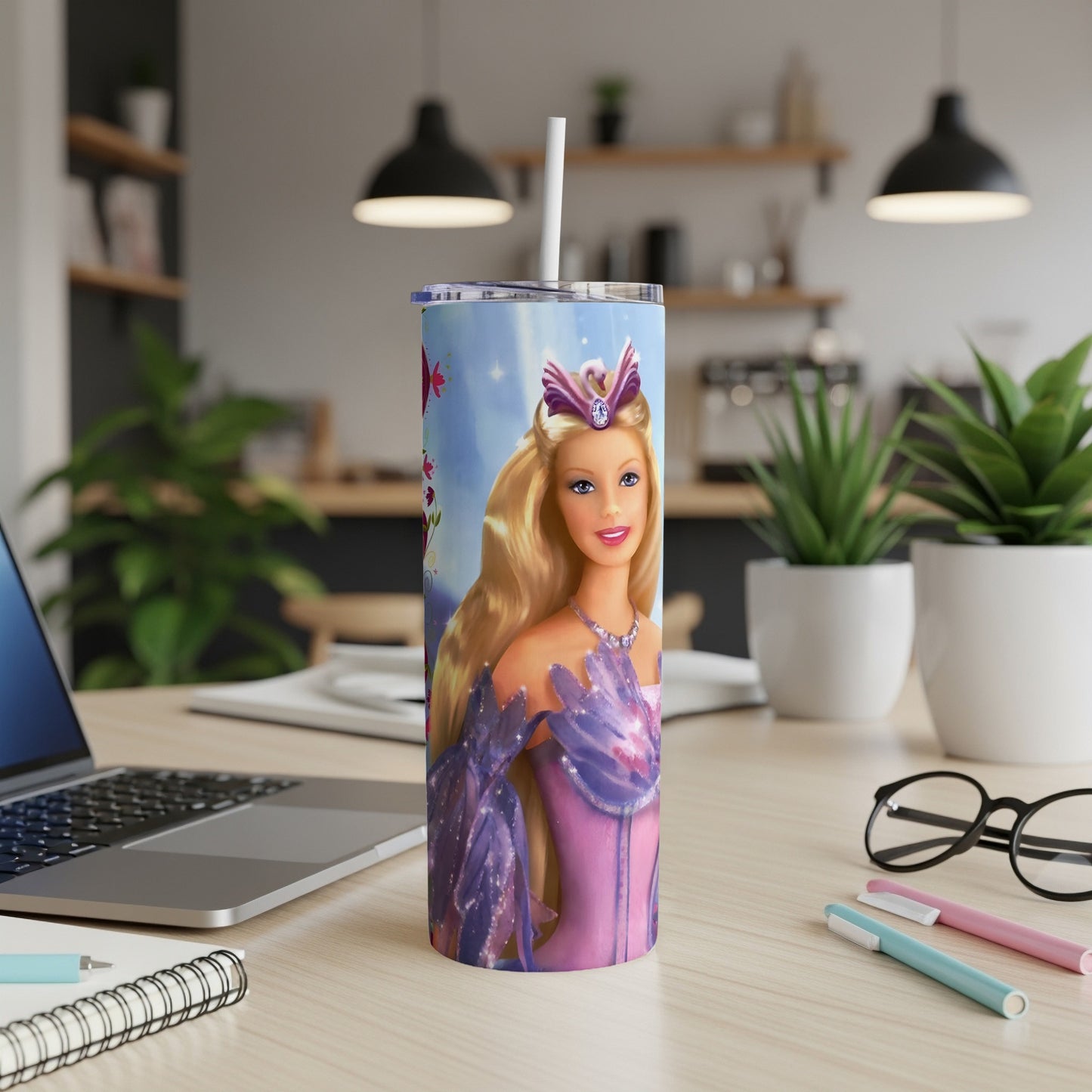 Barbie in a sparkling purple dress on a white tumbler with a straw.