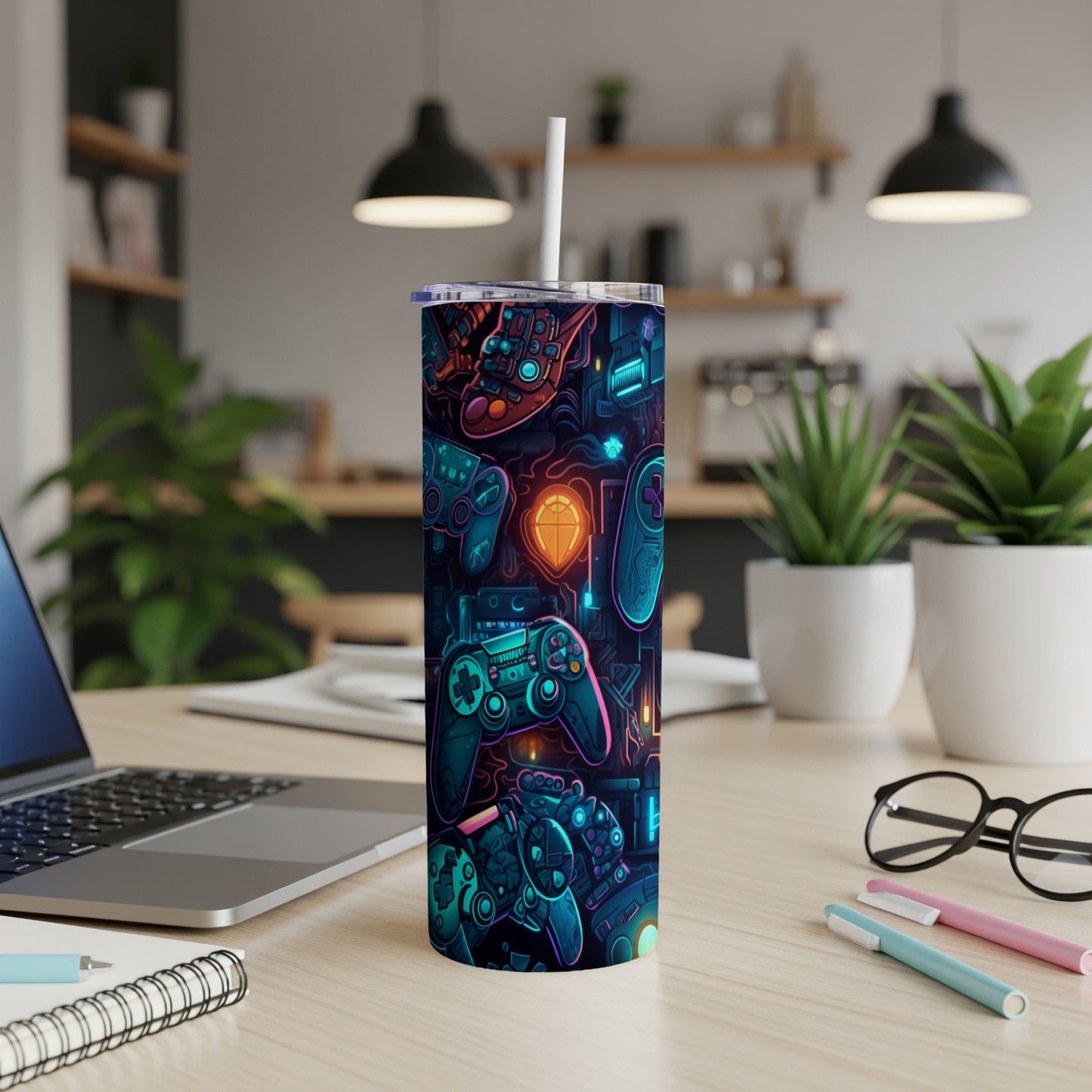 Tumbler with neon-glowing video game controllers and buttons.
