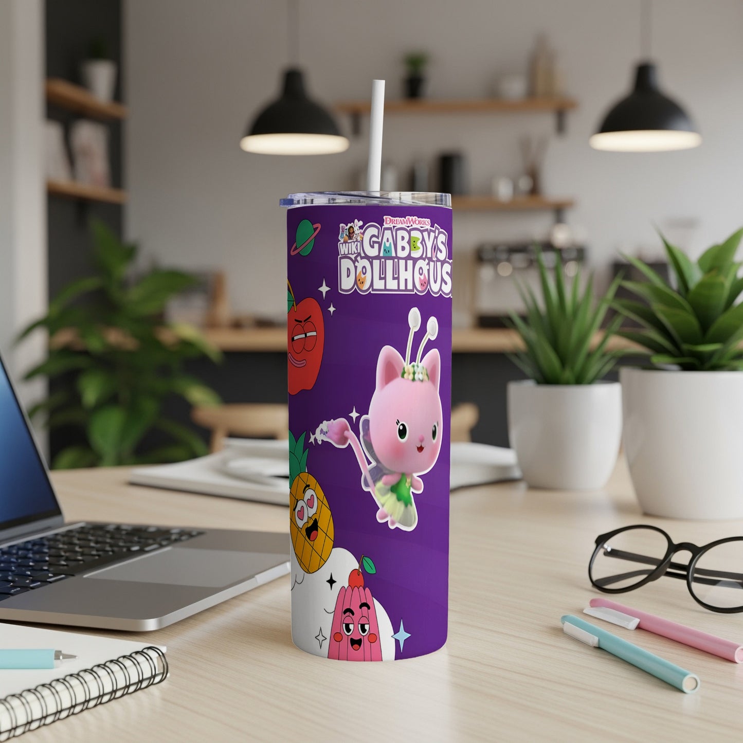 Gabby's Dollhouse themed purple tumbler with cat character and fruit designs.