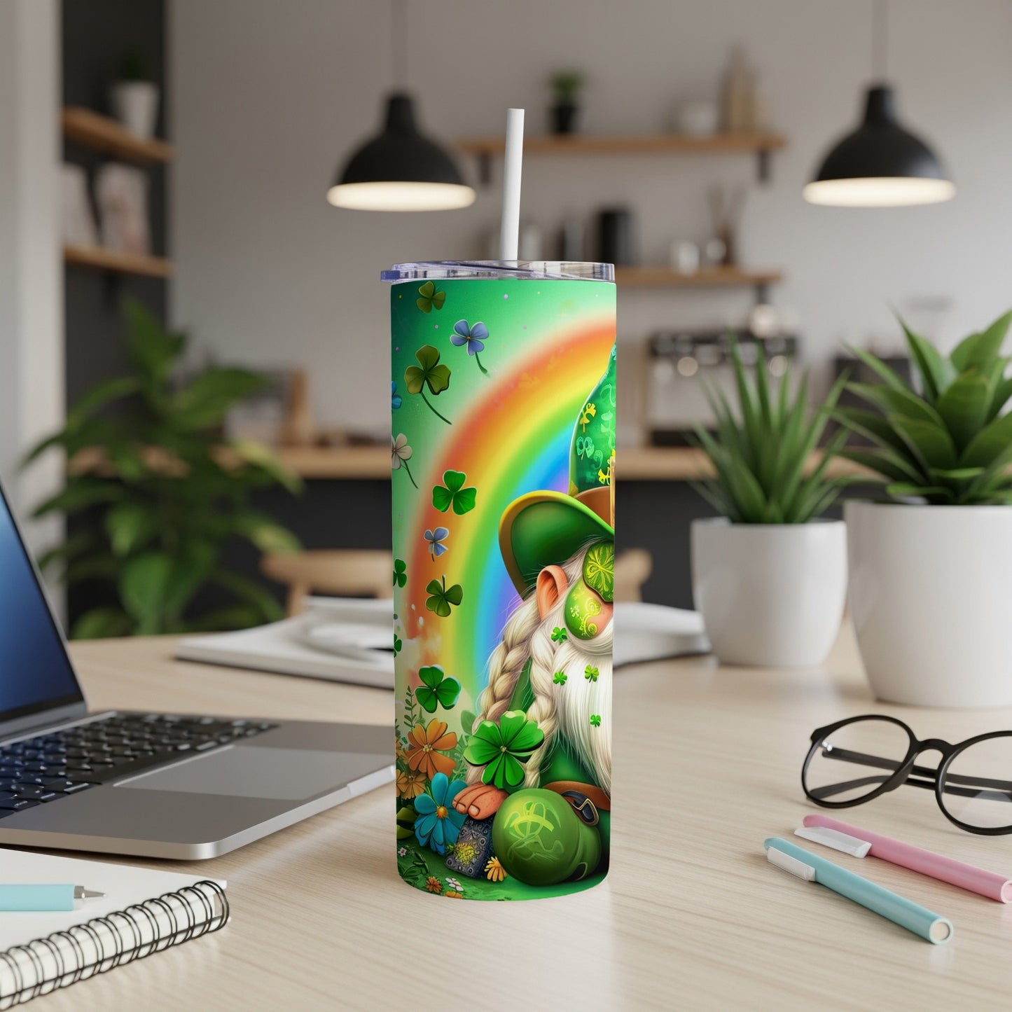 Leprechaun with rainbow and shamrocks on a green tumbler.
