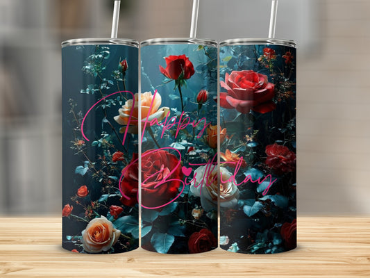 Floral tumbler with "Happy Birthday" text on a wooden surface.