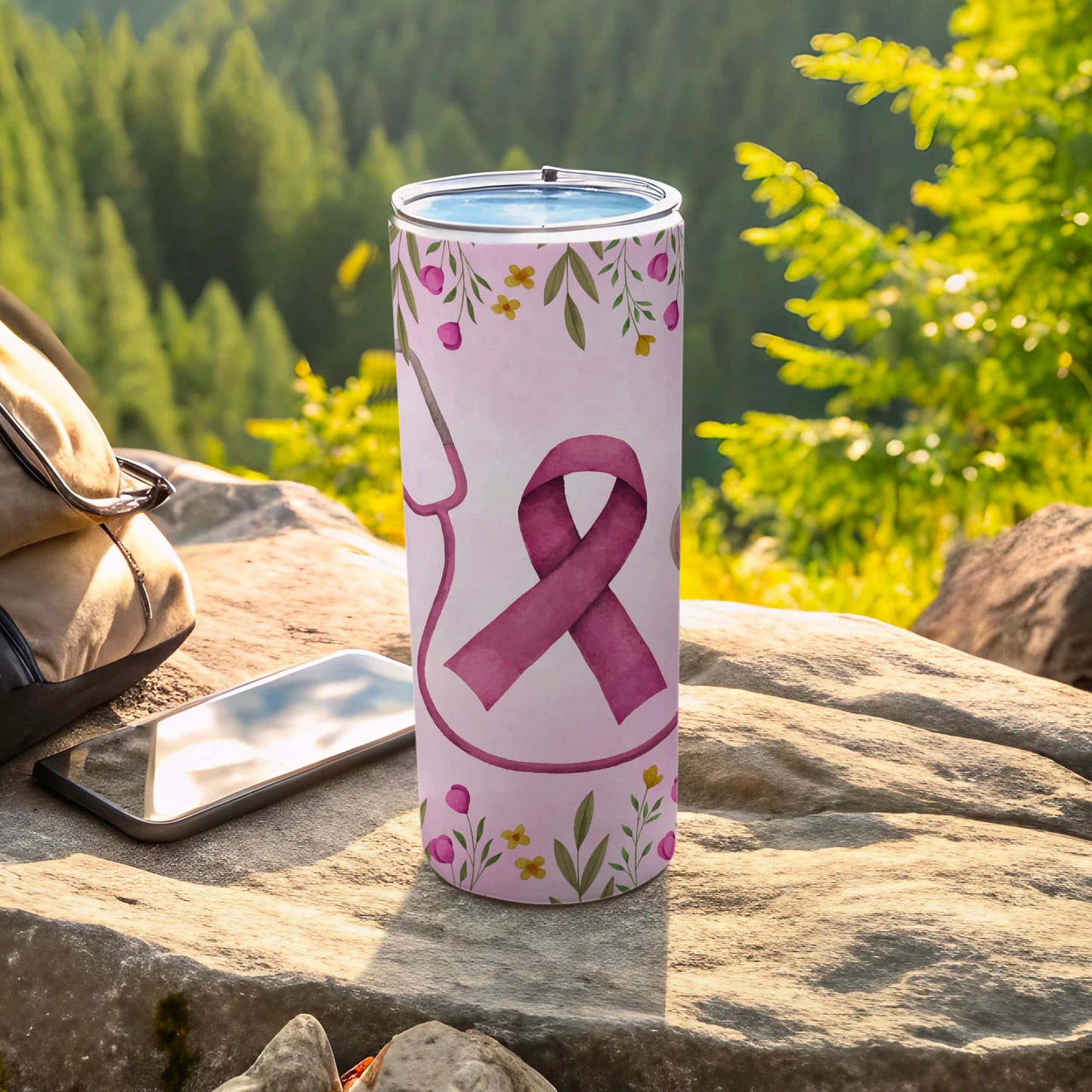 Pink ribbon design with stethoscope and floral accents on a tumbler.