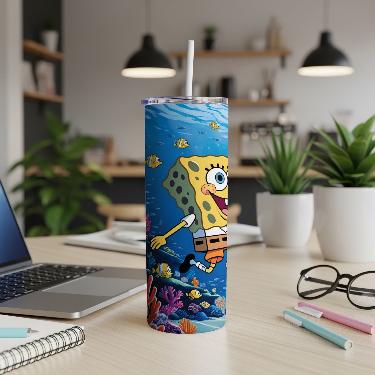 SpongeBob SquarePants on a blue ocean background with coral and fish.
