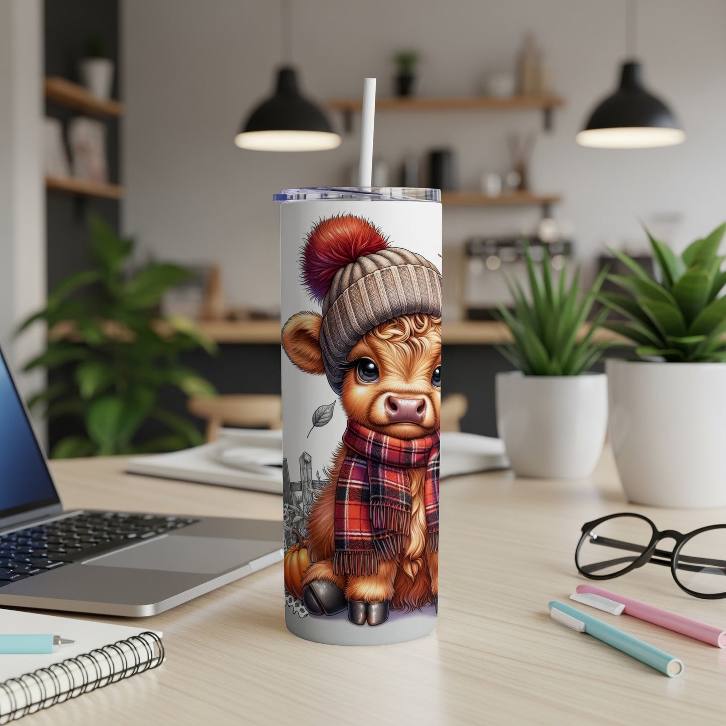 Cow tumbler with straw featuring a cow wearing a hat and scarf.