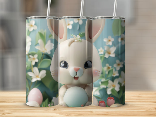 Easter bunny with flowers and eggs on three tumblers.