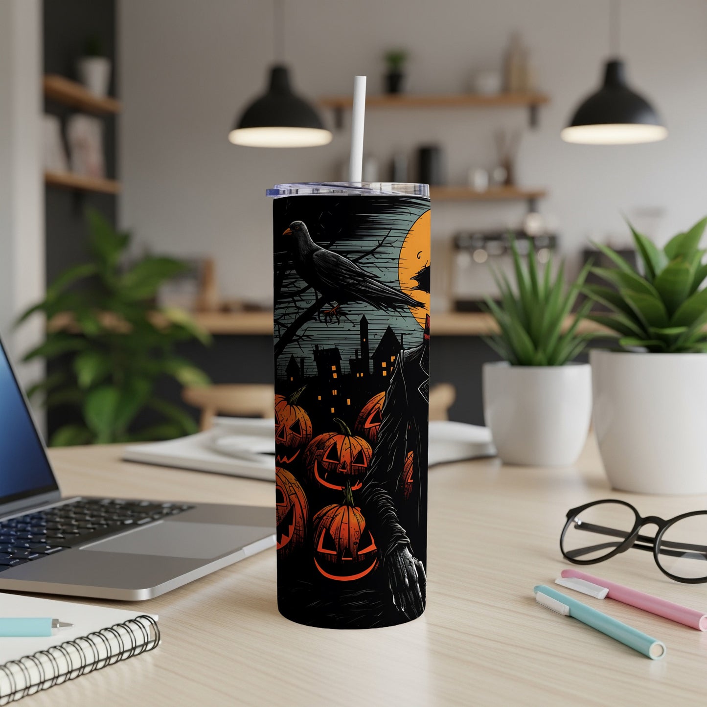 Tall tumbler with Halloween illustration of pumpkins, a crow, and spooky town.
