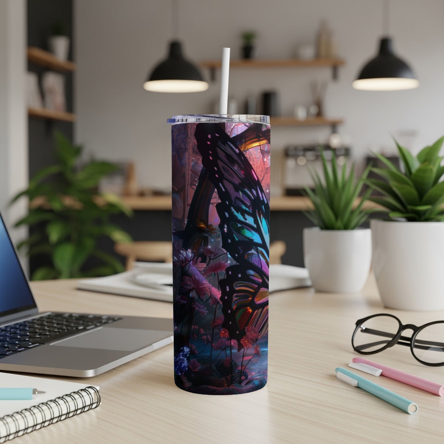 Iridescent butterfly wings on a dark, moody tumbler with a straw.