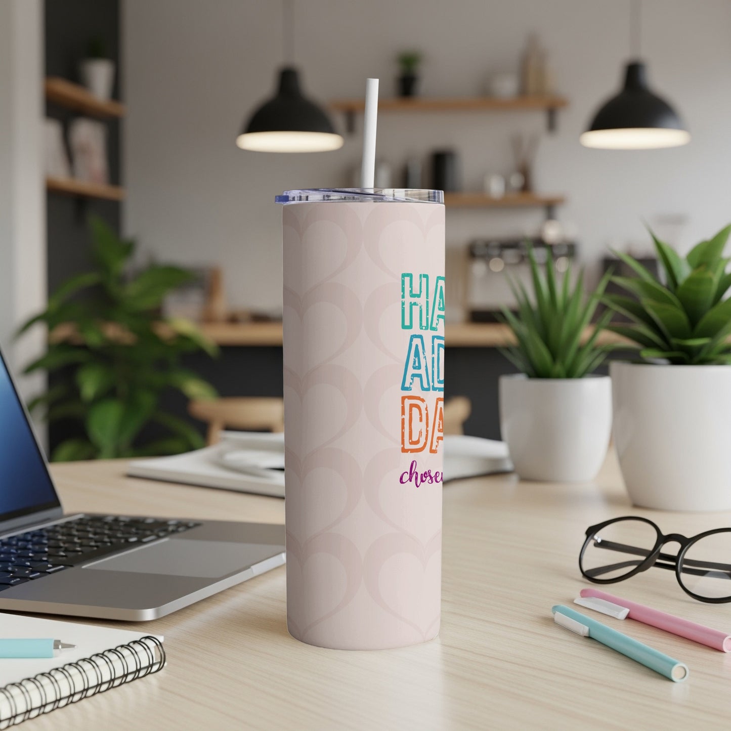 Light pink tumbler with hearts pattern and "Happy Day" text.