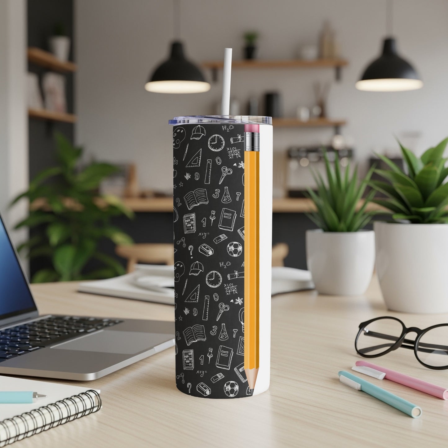 Black tumbler with school-themed icons and math equations, showing a pencil design.