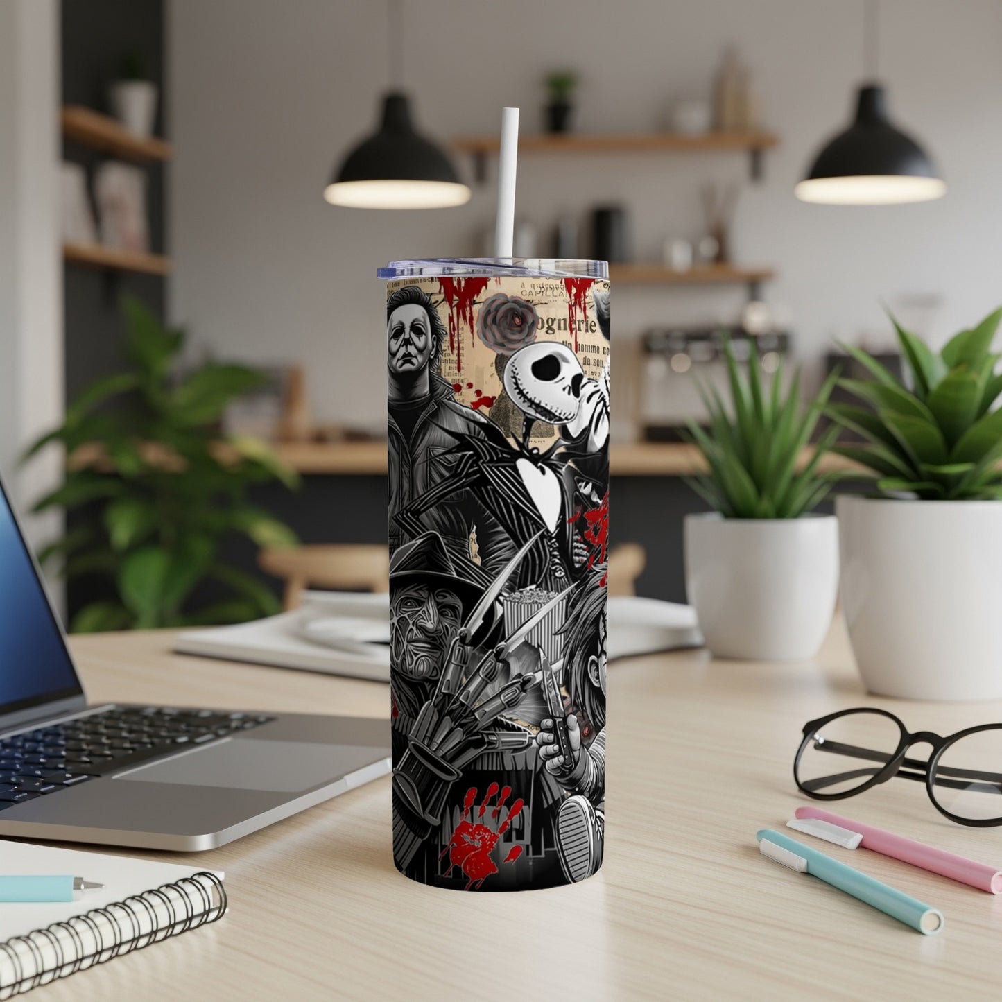 Tumbler with horror movie villains, Jack Skellington, and blood splatters.