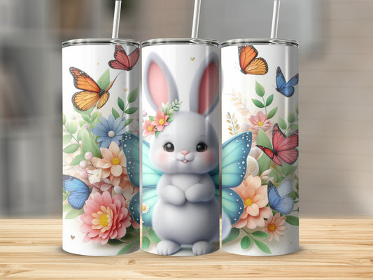 White bunny with butterfly wings surrounded by flowers and butterflies.