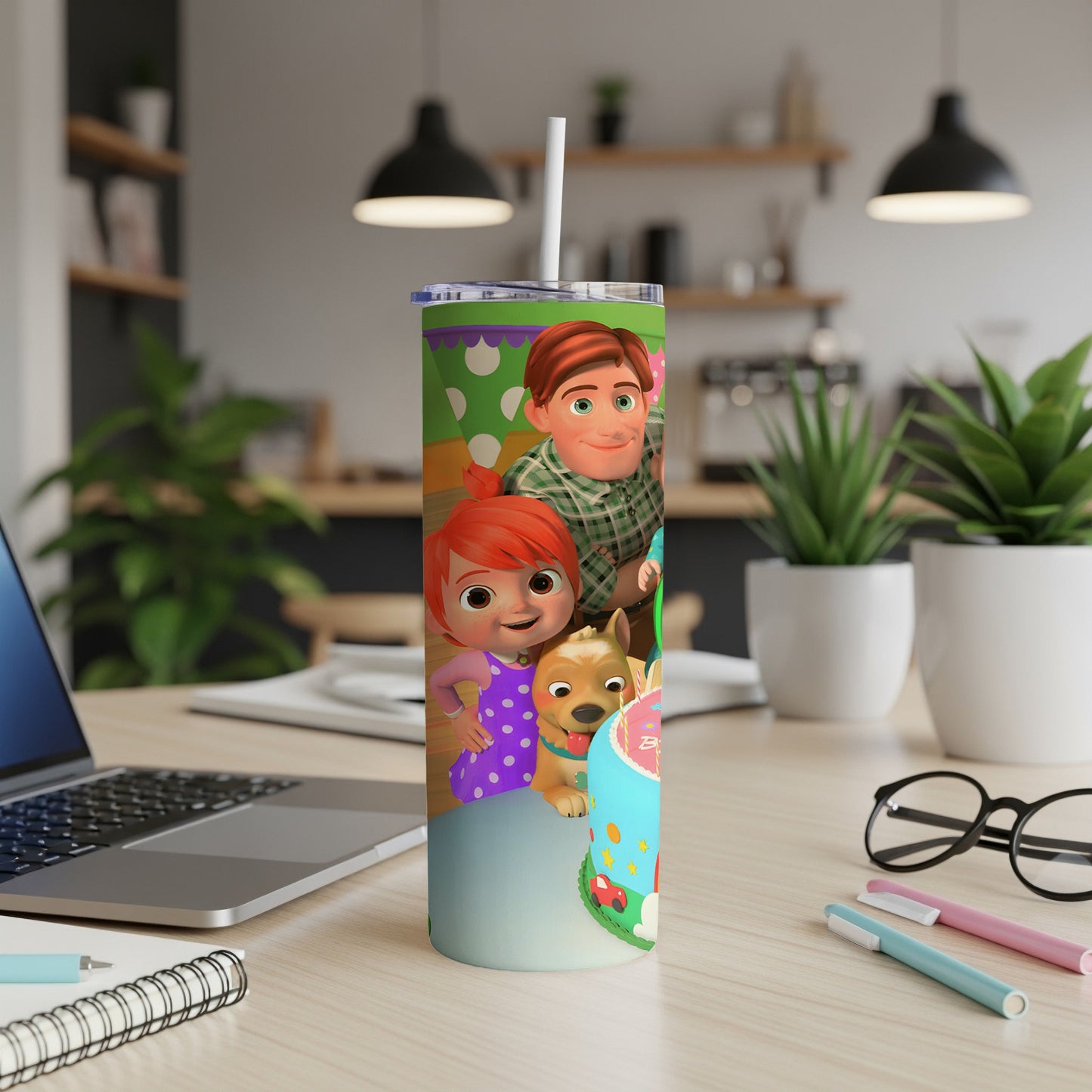 Cocomelon characters JJ, Cody, and a dog on a decorated tumbler.