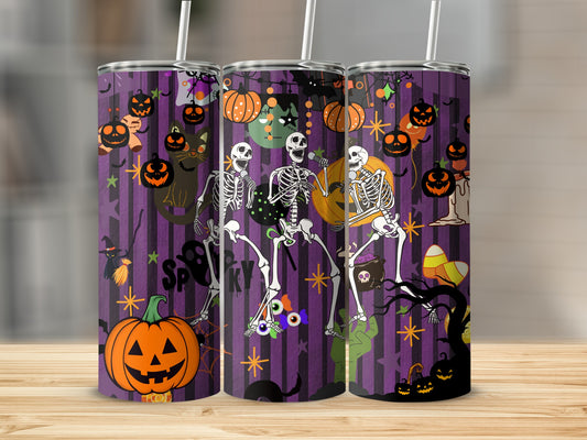Three tumblers with a Halloween theme featuring dancing skeletons, pumpkins, and black cats.