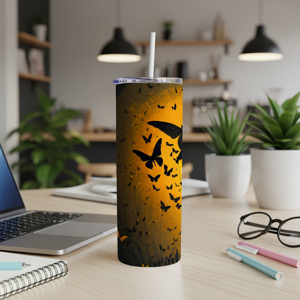 Tumbler with a spooky black butterfly swarm against an orange gradient background.