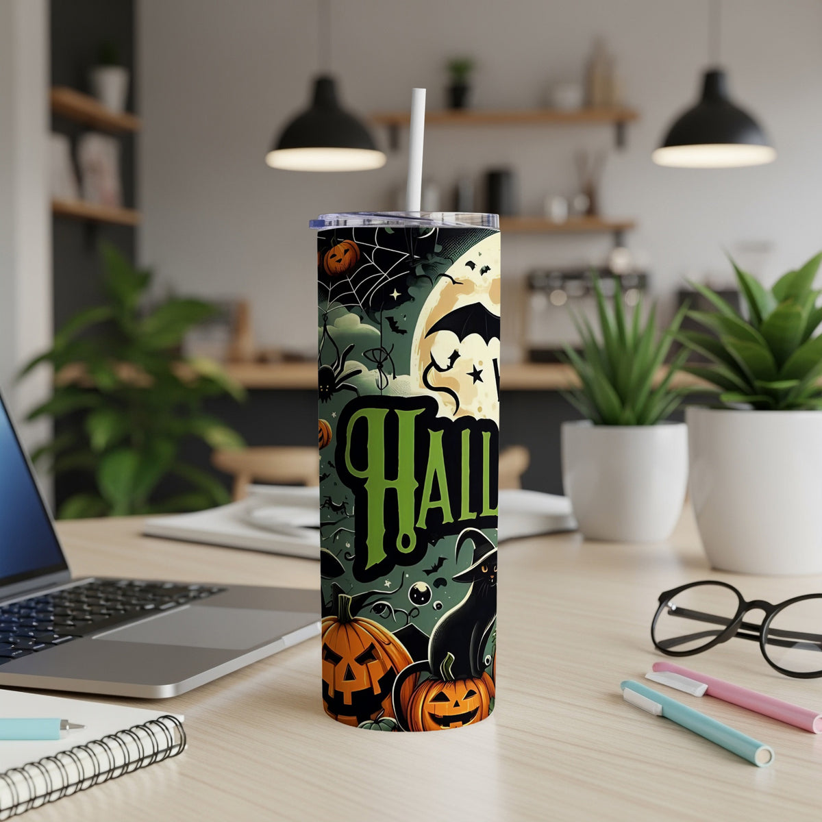 Tall tumbler with Halloween theme, featuring pumpkins, bats, and a black cat.