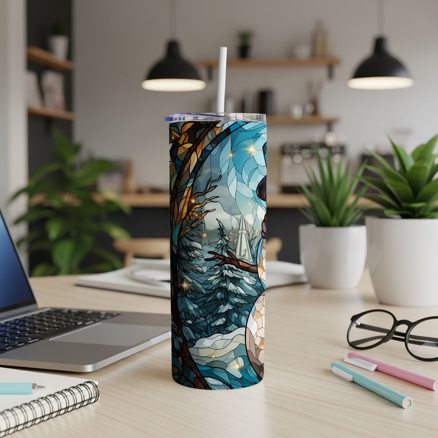 Winter scene tumbler with snowman and stained glass pattern.