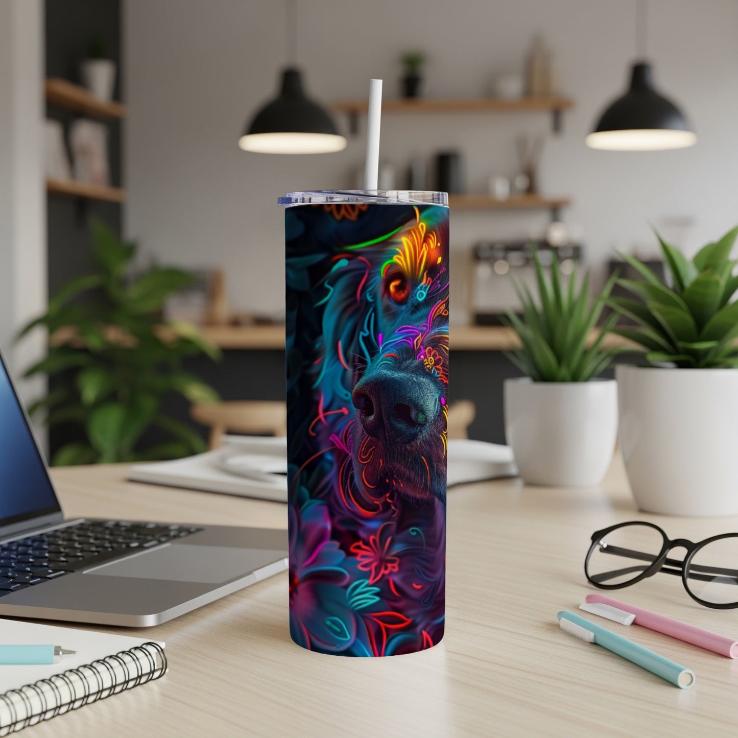 Black dog face with neon floral accents on a tumbler.