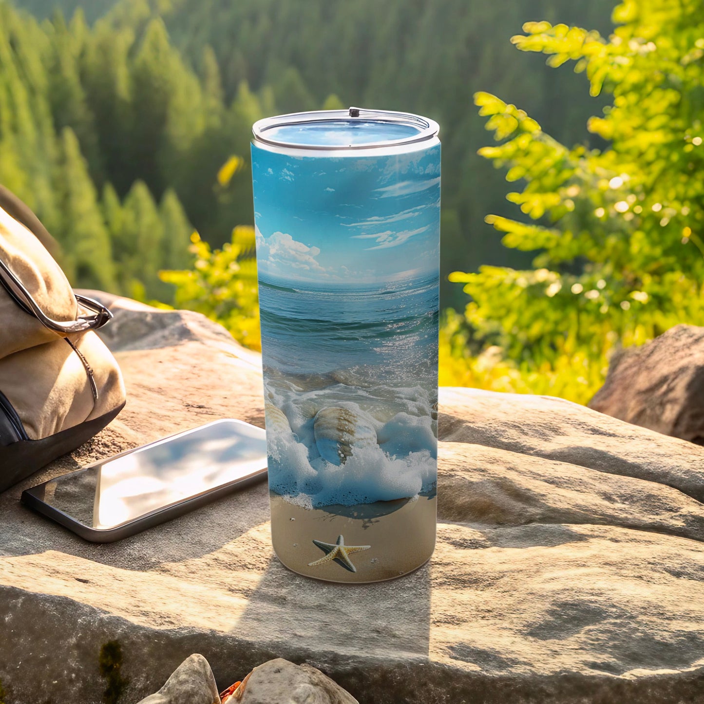 Beach scene tumbler with starfish design on a rock.