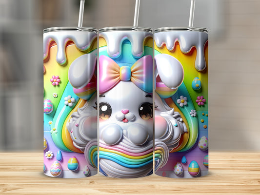 White bunny tumbler with rainbow and Easter egg decorations.