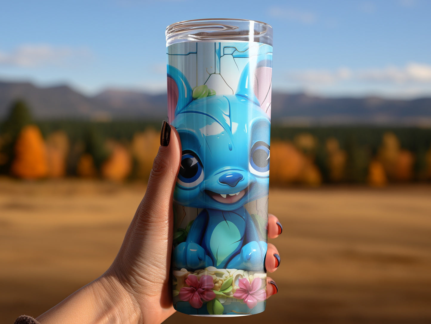 Adorable Blue Creature Design with Flowers Tumbler