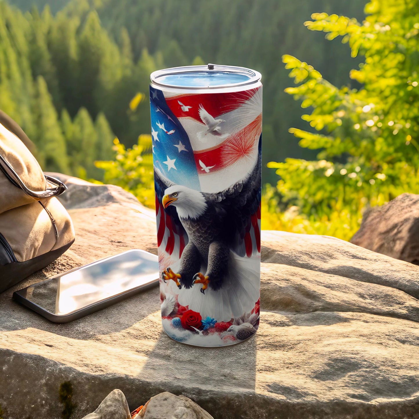 American flag, eagle, and dove graphic on a stainless steel tumbler.