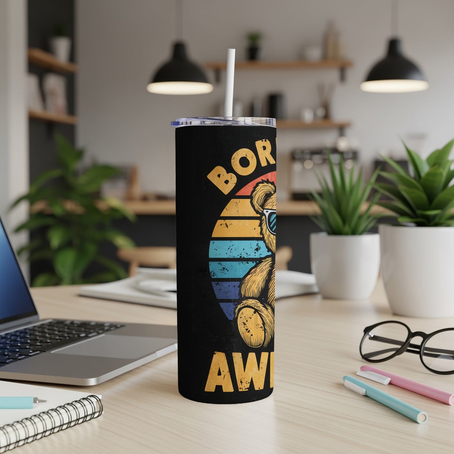 Black tumbler with retro teddy bear wearing sunglasses and text "BORN AWESOME".