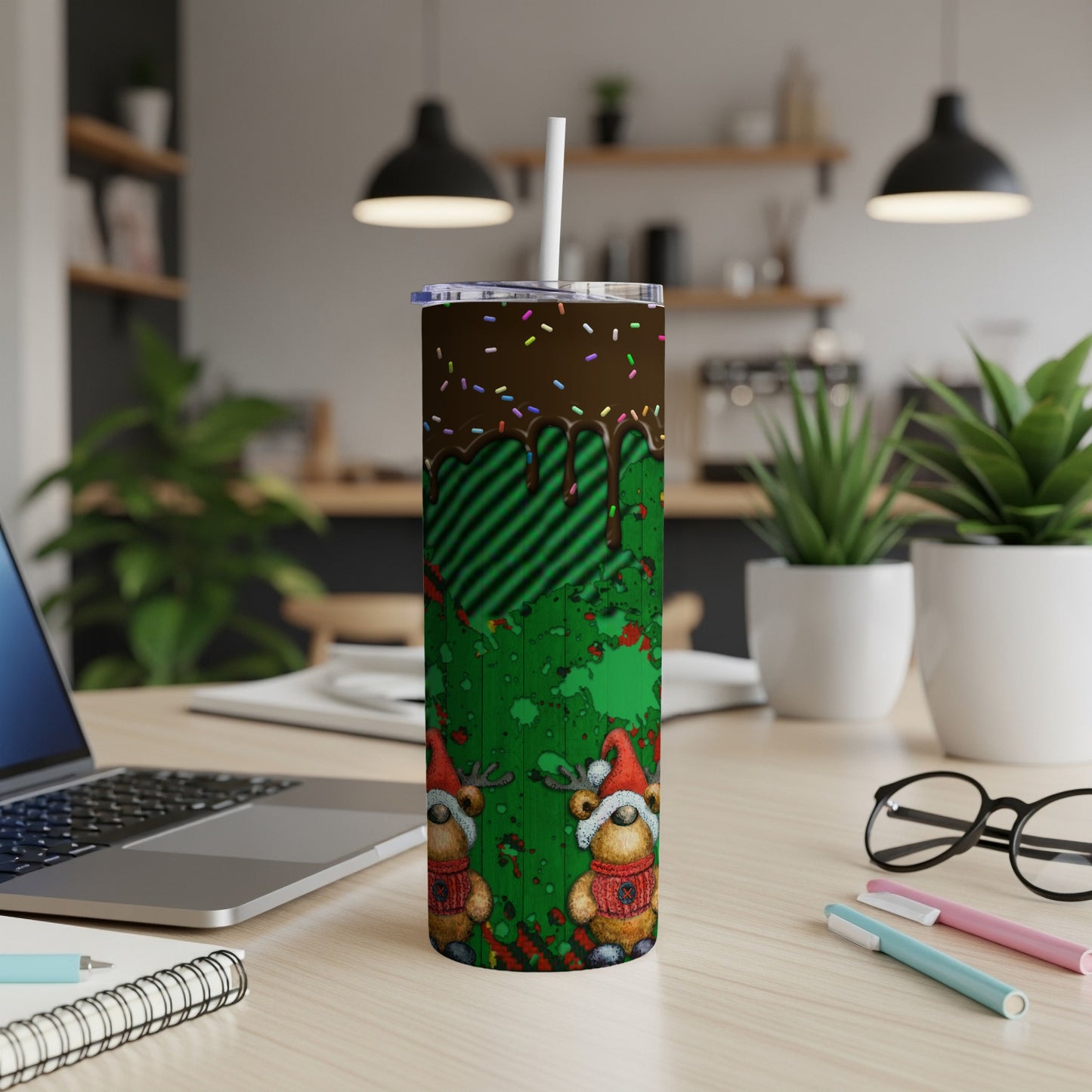Green and brown Christmas tumbler with gnomes and candy cane stripes.
