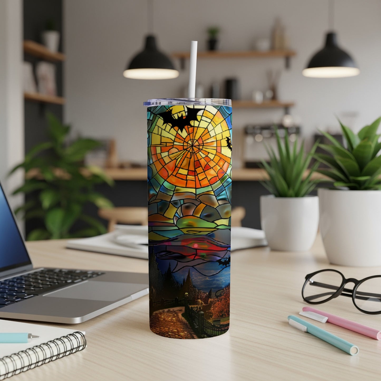 Stained glass tumbler with Halloween scene, bats, and moon.