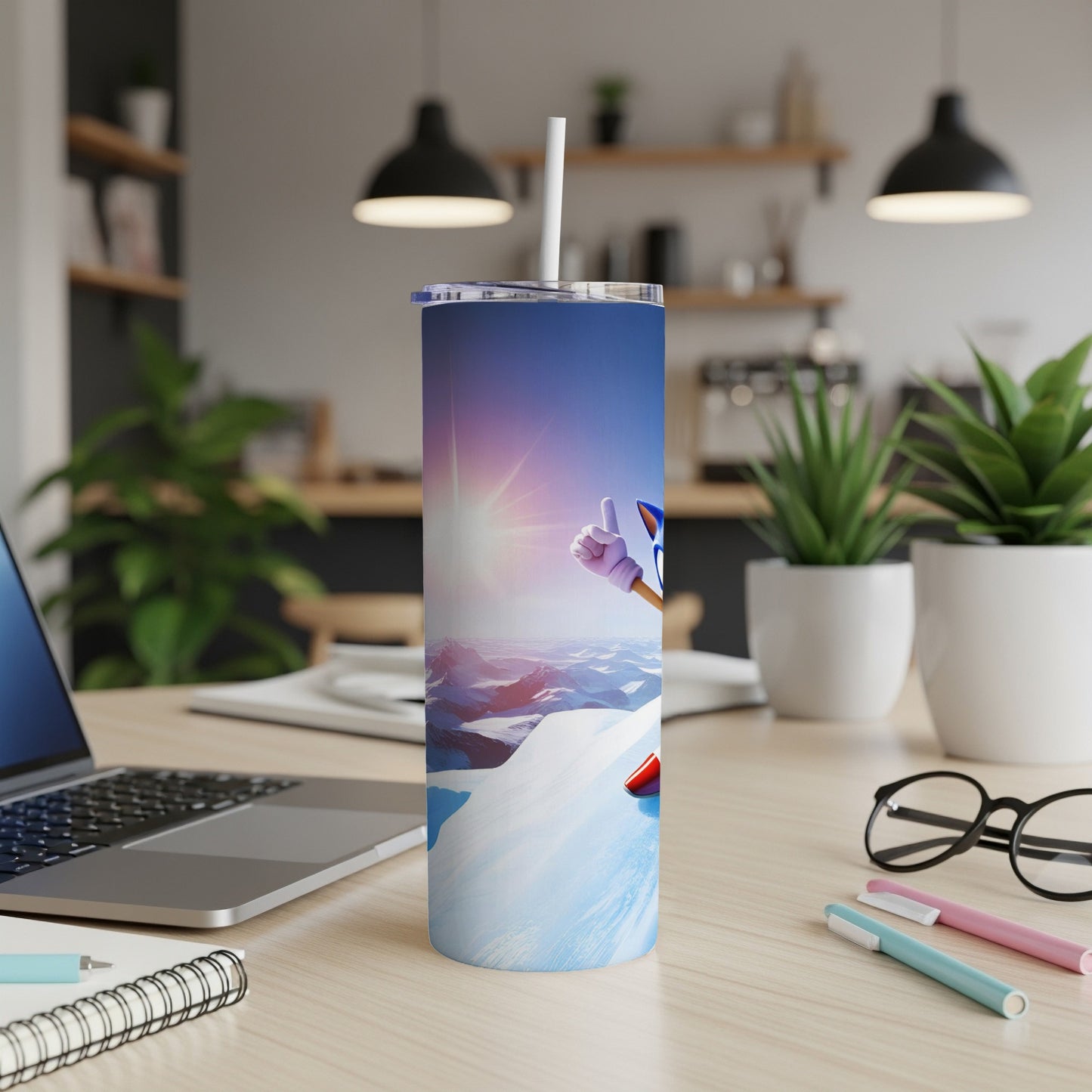 Snowboarder with thumbs up on a blue and white patterned tumbler.
