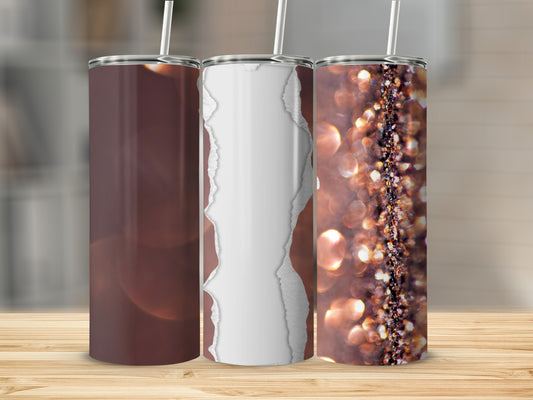 Three tumblers with brown, ripped paper, and glitter designs on a wooden surface.
