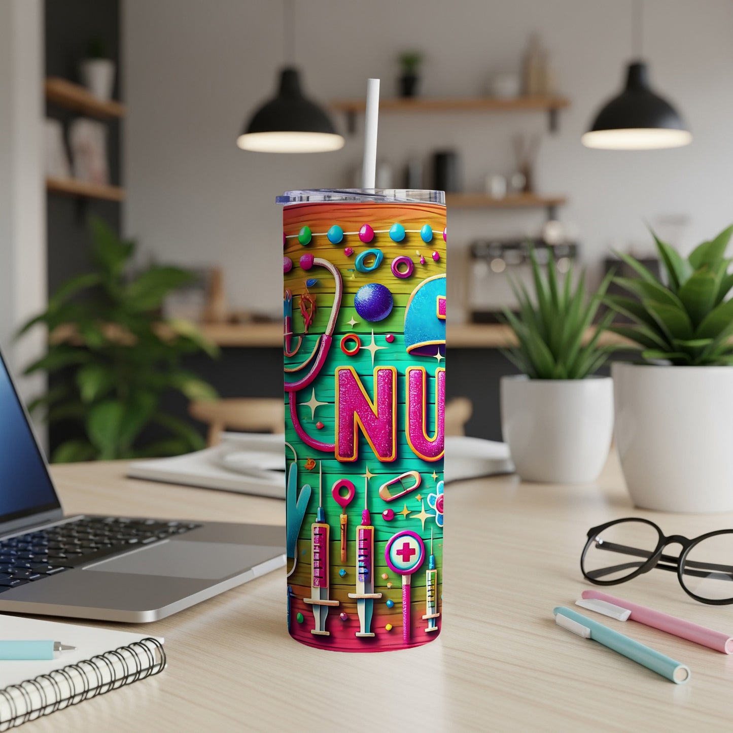 Colorful tumbler with "NURSE" text and medical icons on a desk.