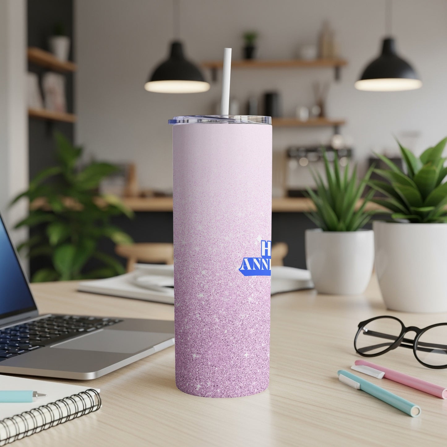Glittery purple tumbler with "Happy Anniversary" text and a straw.