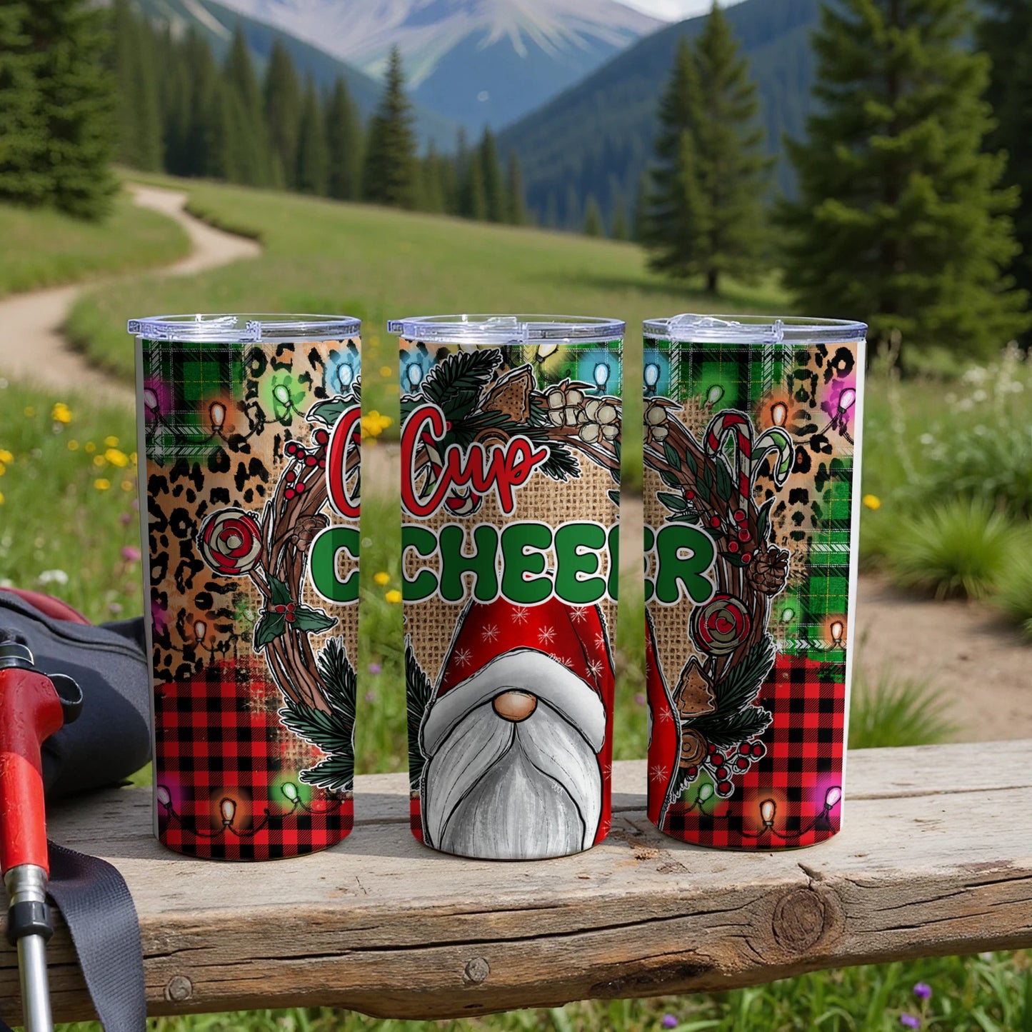 Three Christmas-themed tumblers with a gnome, plaid, and leopard print designs.