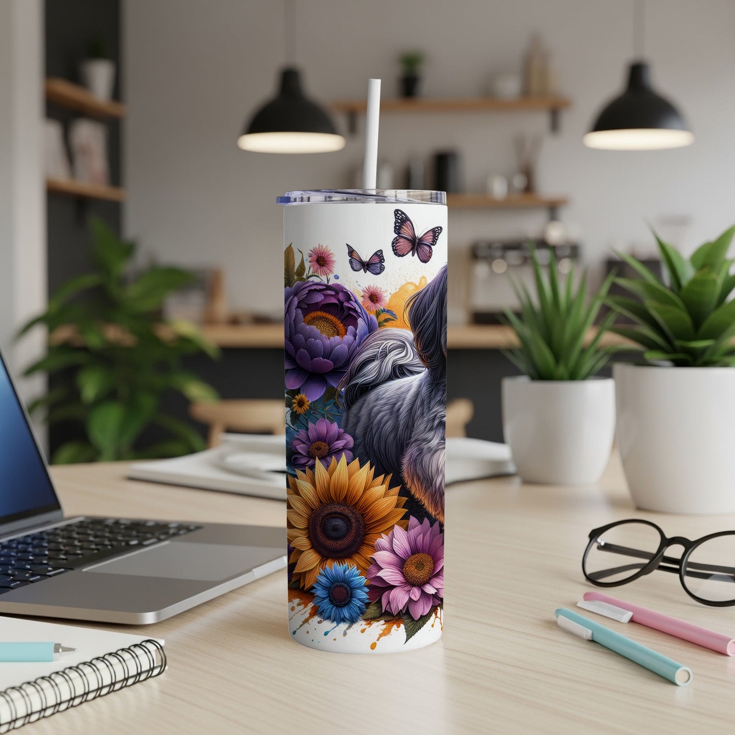 Gray dog with sunflowers and purple flowers on a white tumbler.