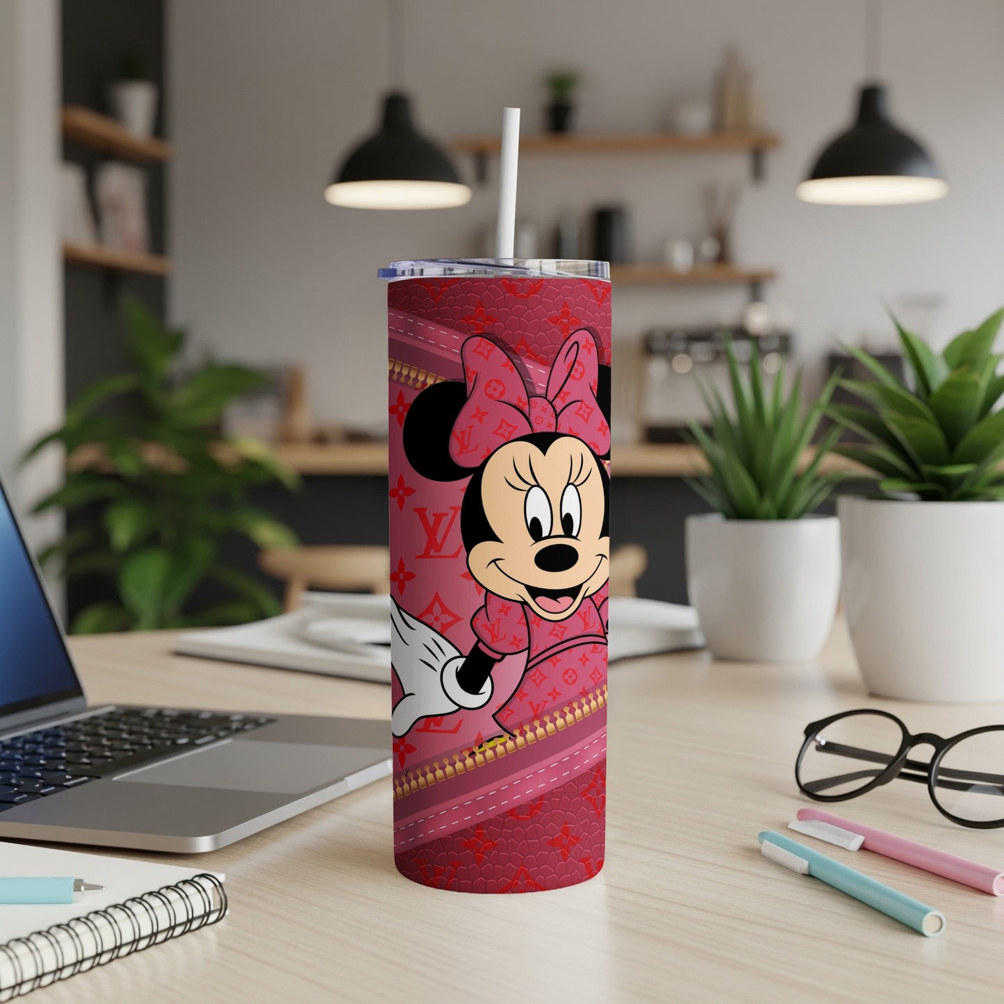 Minnie Mouse tumbler with pink LV pattern and white straw.