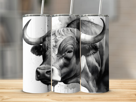 Black and white watercolor bull painting on a tumbler.