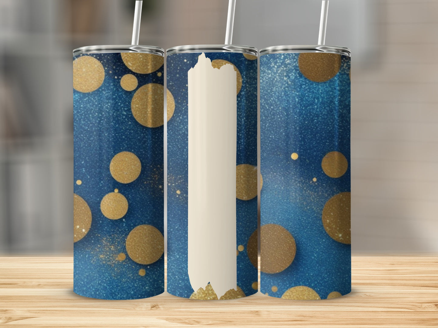 Three tumblers with blue and gold speckled glitter pattern.