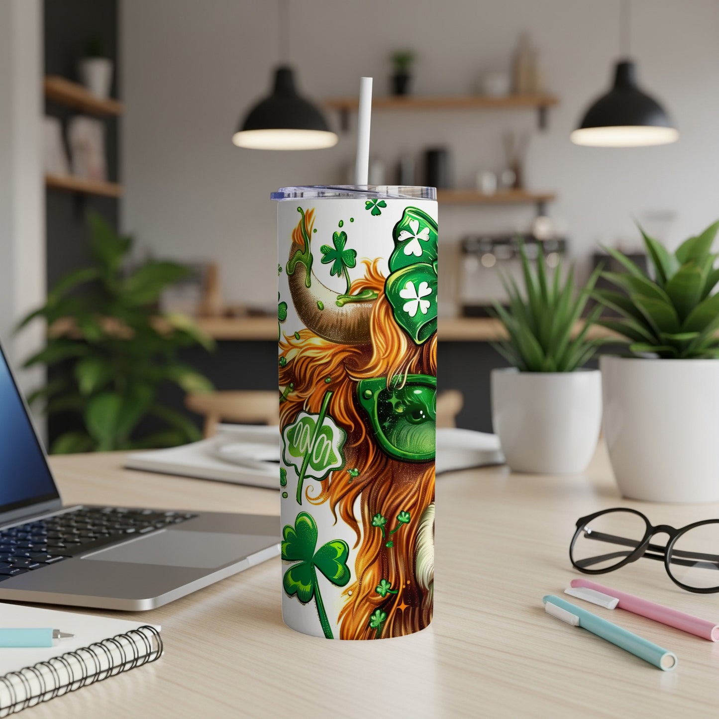 St. Patrick's Day Highland cow tumbler with shamrocks and green sunglasses.