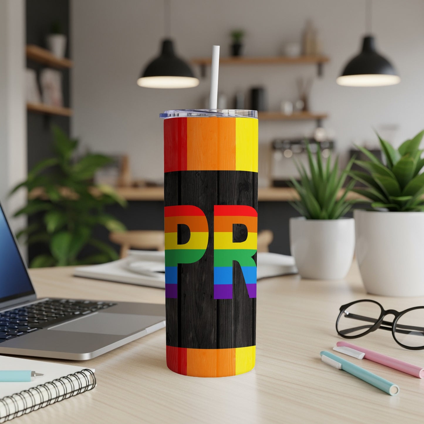Rainbow pride flag tumbler with "PR" text.