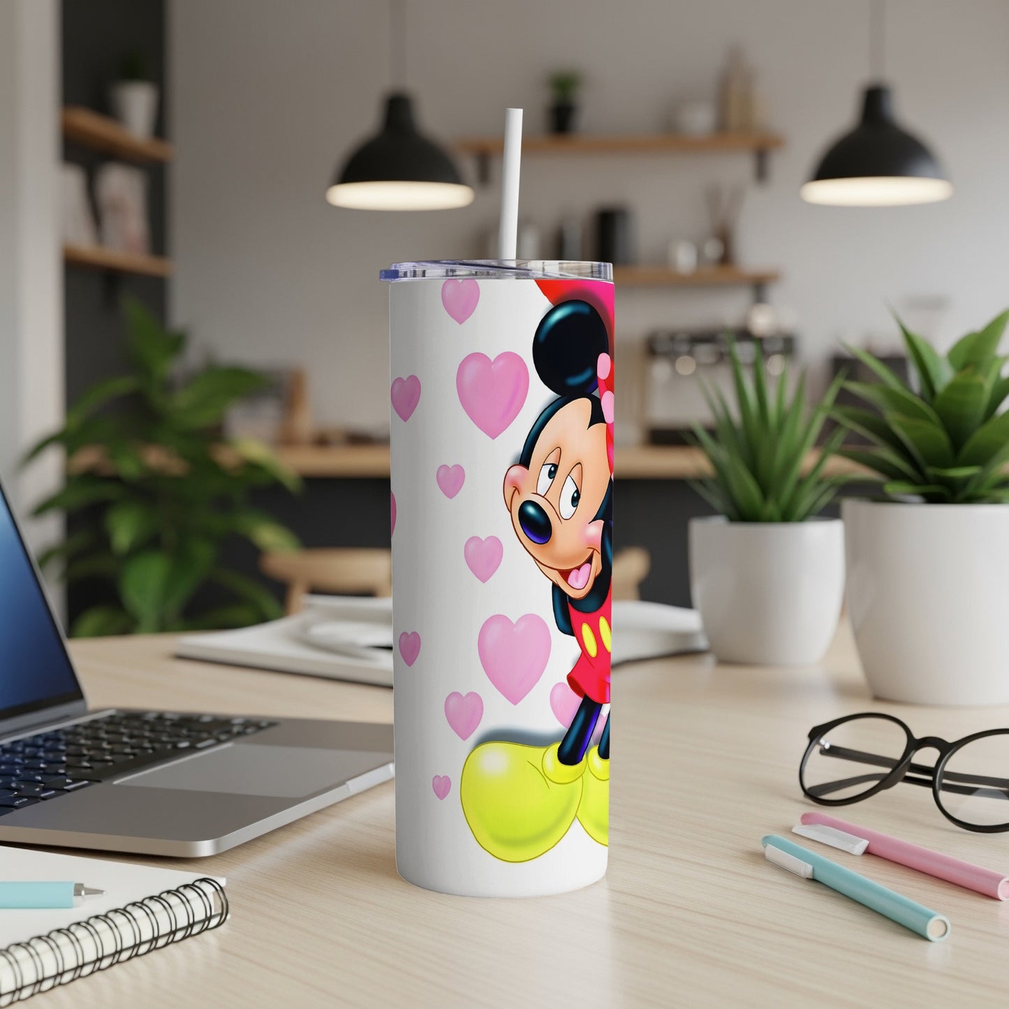 Mickey Mouse on a white tumbler with pink hearts, straw.