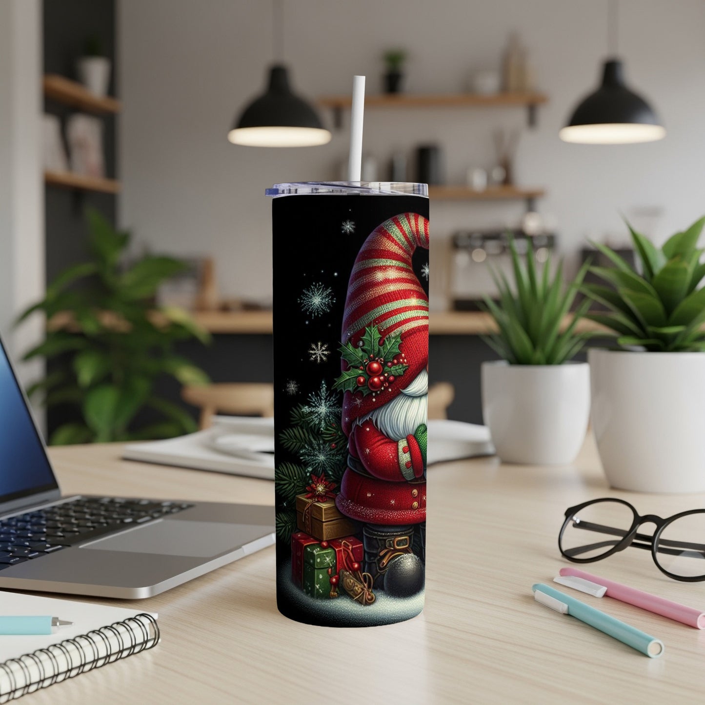 Christmas gnome with striped hat and gifts on a tall tumbler.