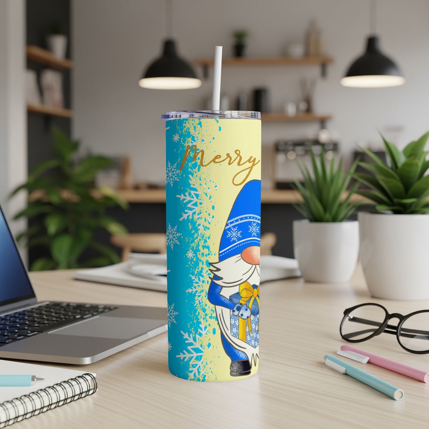 Gnome with gift on yellow and blue patterned tumbler with straw.