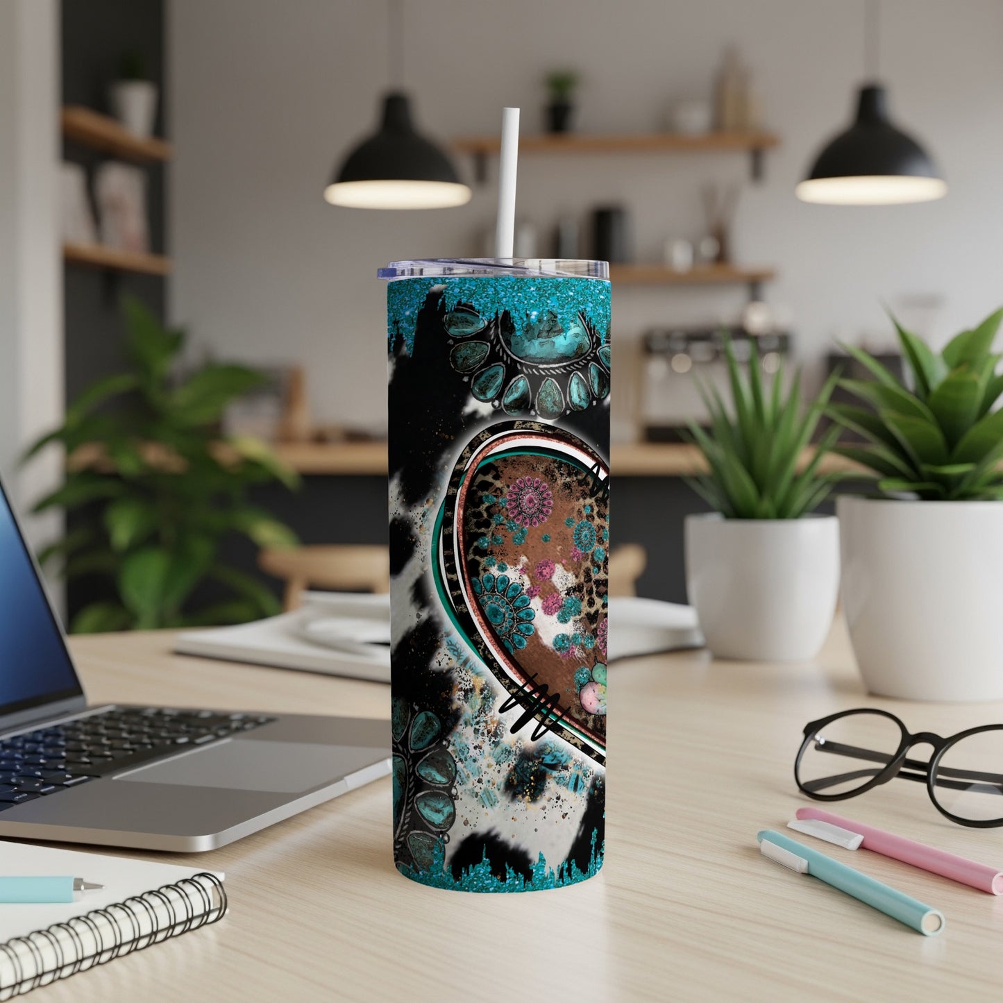 Turquoise heart with floral and animal print on a skinny tumbler.