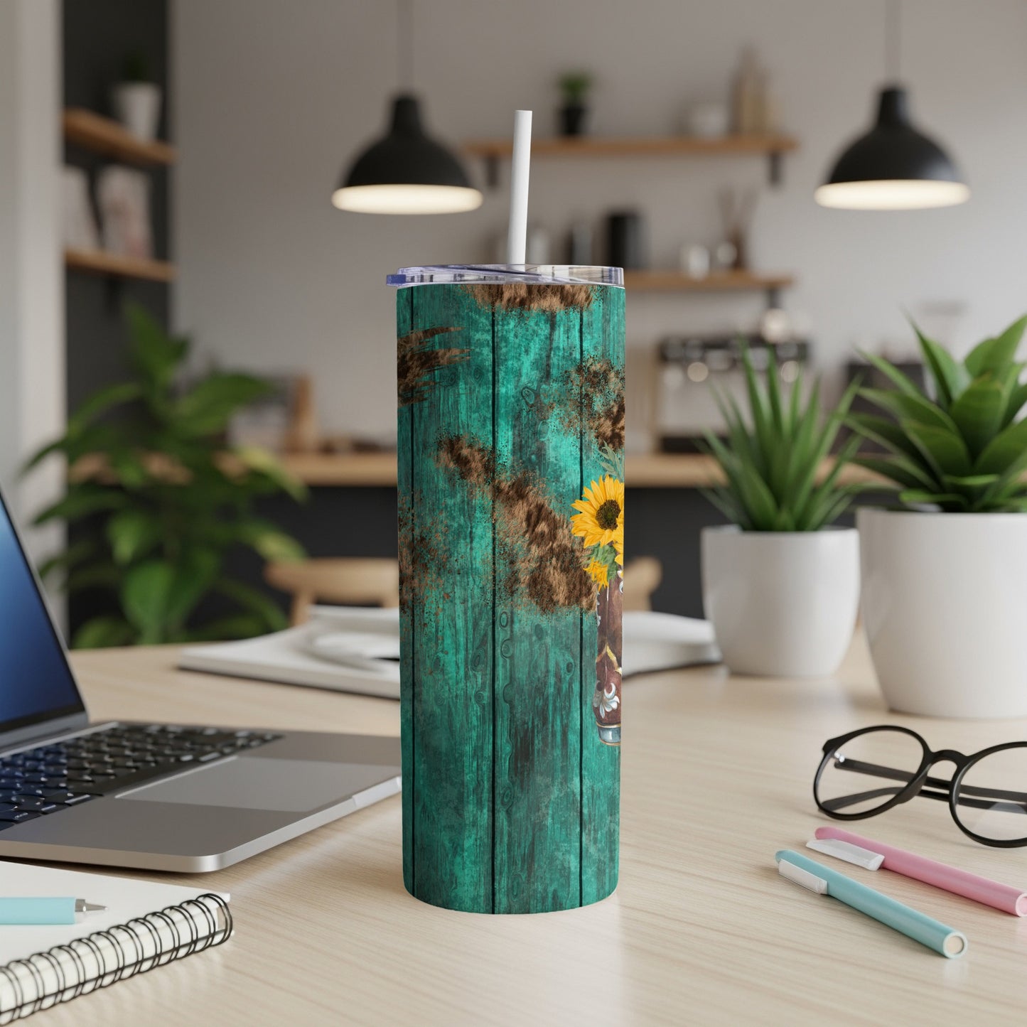 Turquoise wood-grain tumbler with sunflower and cowboy boot design.